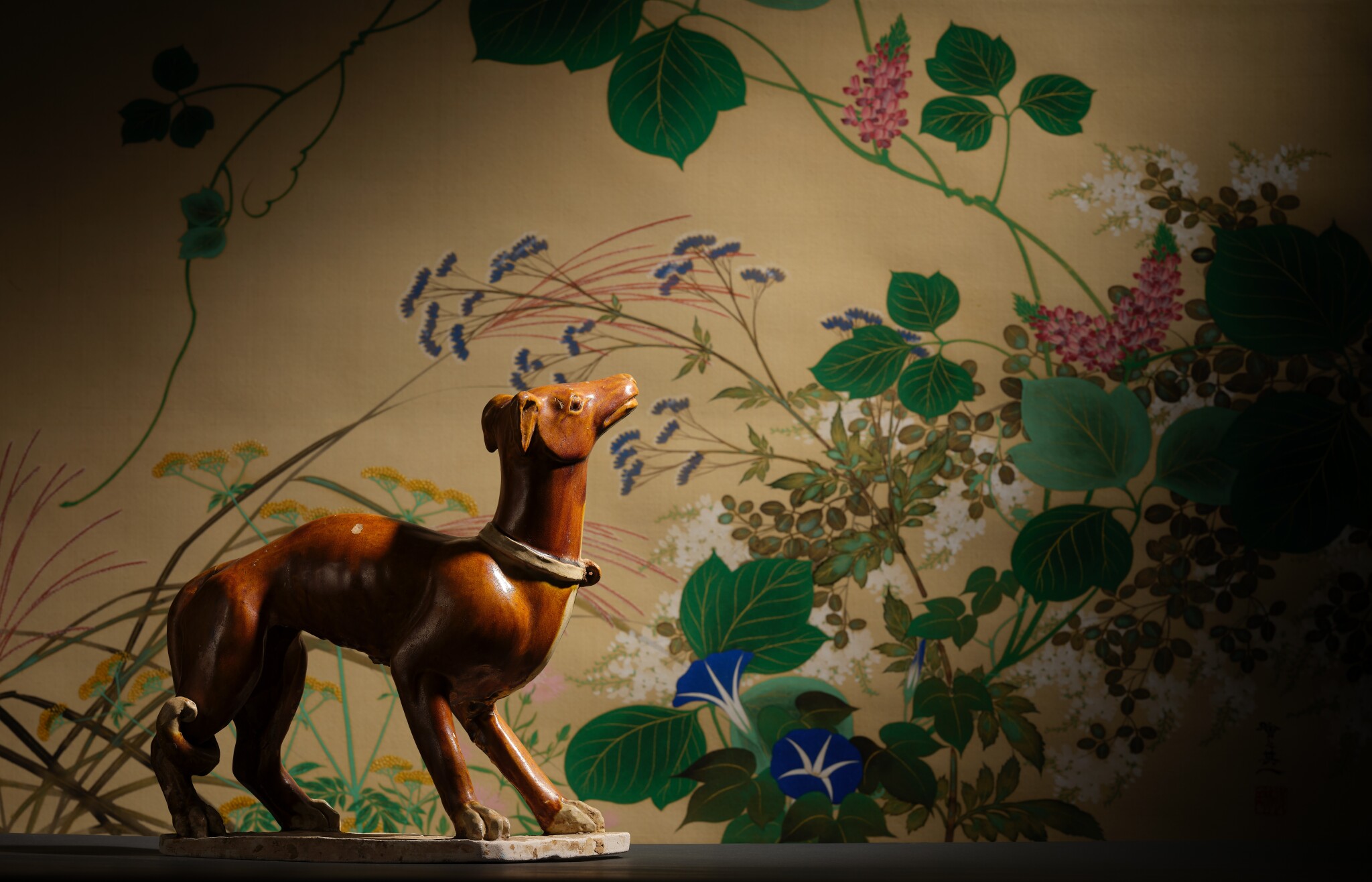 A rare amber-glazed figure of a dog, Tang dynasty  view 6